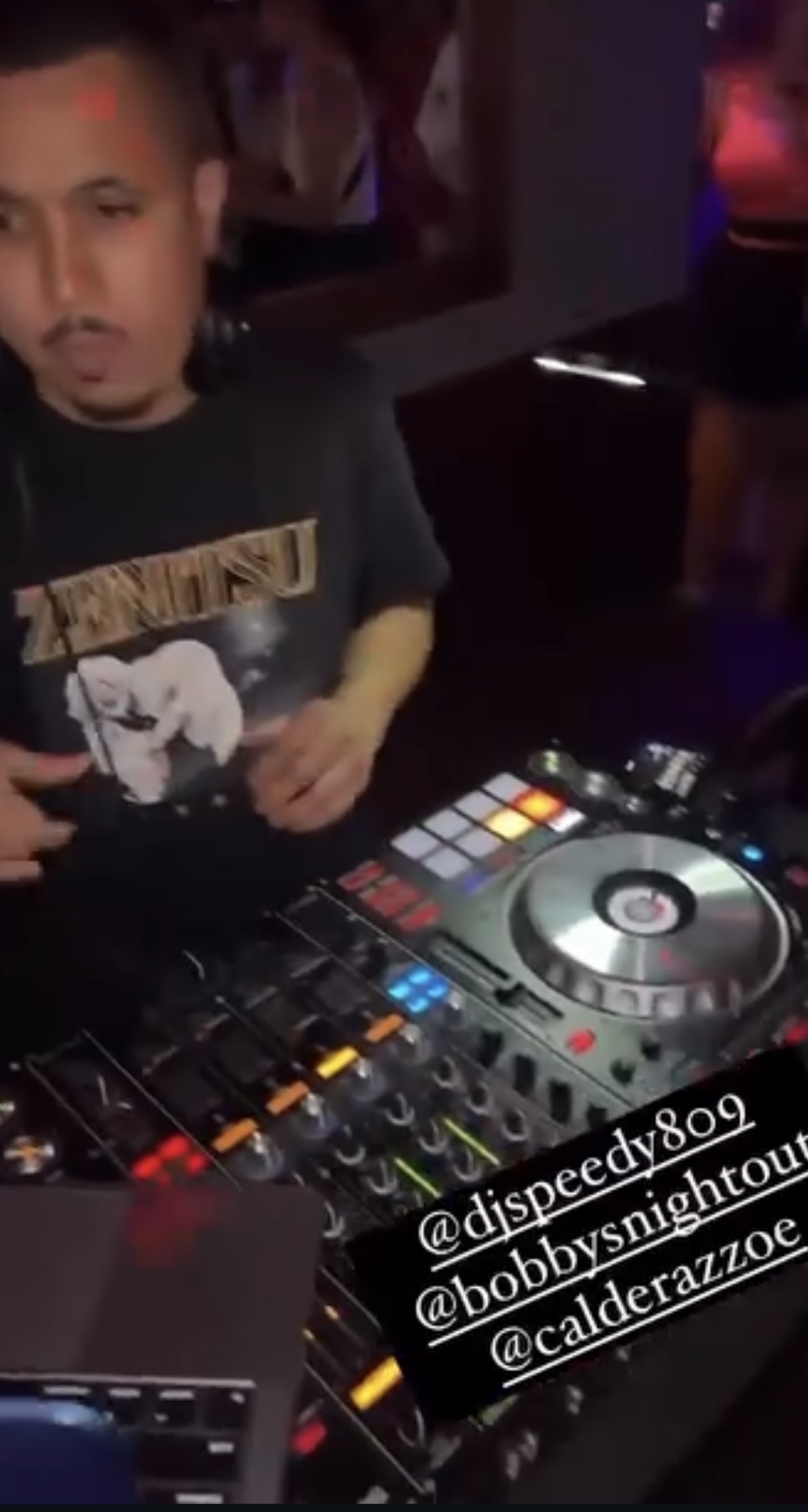 DJ Speedy performing